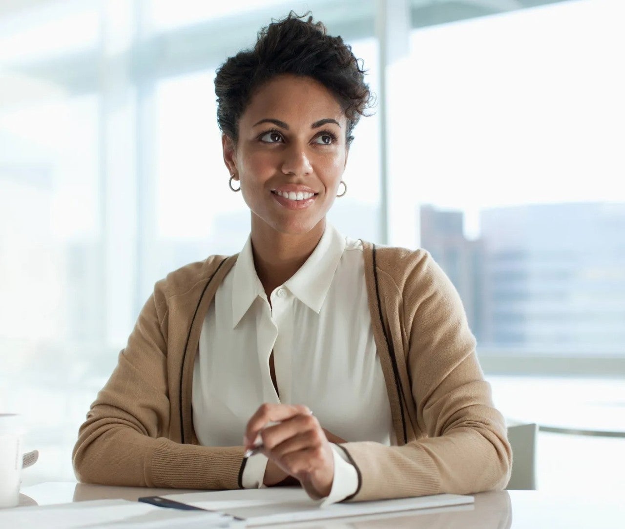 Woman Laughing while Thinking